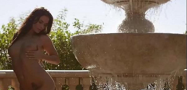  Natural babe beauty teases hard by the fountain solo